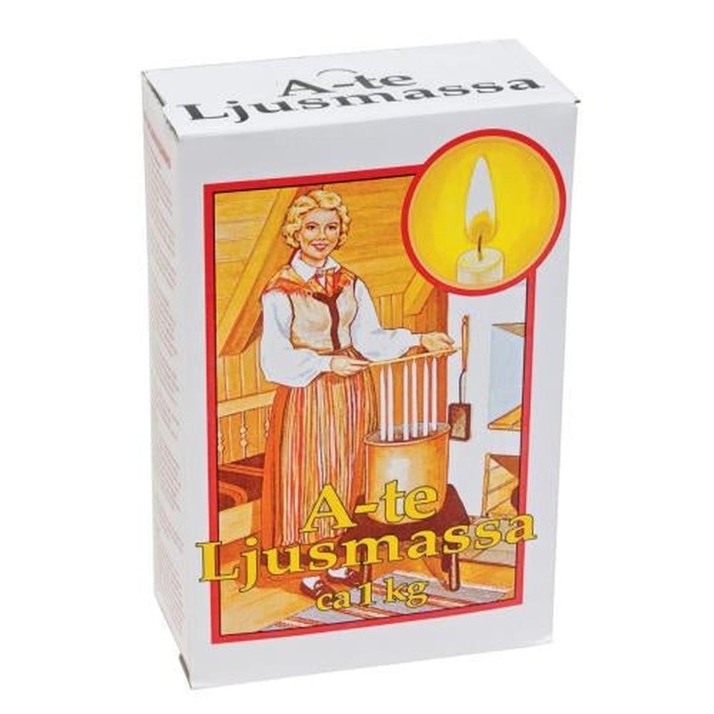 Hvit eske med A-te Ljusmassa 1 kg, illustrasjon av kvinne og lys.